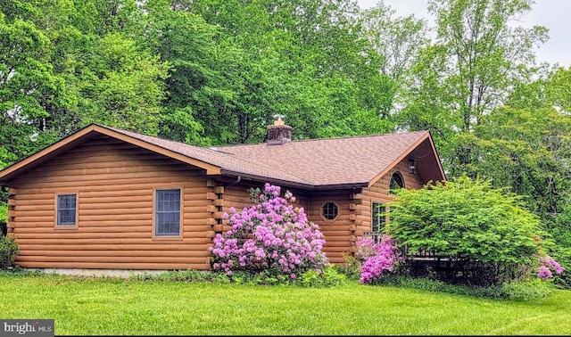 5925 Huntingtown Rd, Huntingtown, MD 20639 - log-style house with log exterior, a chimney, and a front yard