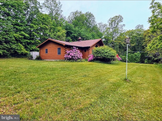 5925 Huntingtown Rd, Huntingtown, MD 20639 - view of front of property with a chimney, log exterior, and a front lawn
