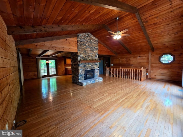 5925 Huntingtown Rd, Huntingtown, MD 20639 - unfurnished living room featuring wood ceiling, hardwood / wood-style flooring, wood walls, and vaulted ceiling with beams