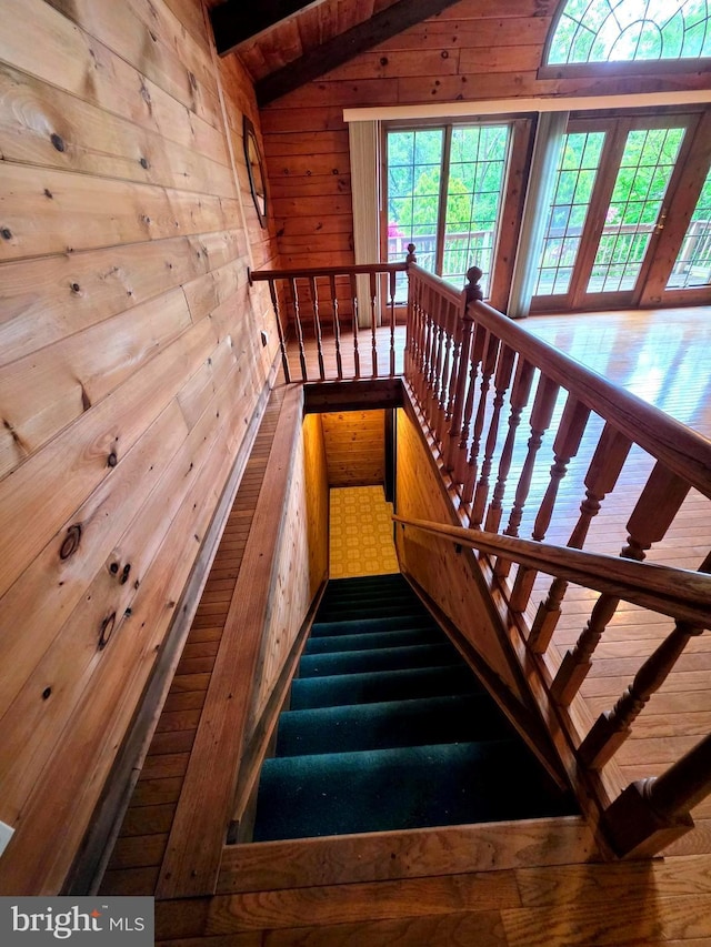 5925 Huntingtown Rd, Huntingtown, MD 20639 - stairs featuring wooden walls and vaulted ceiling with beams