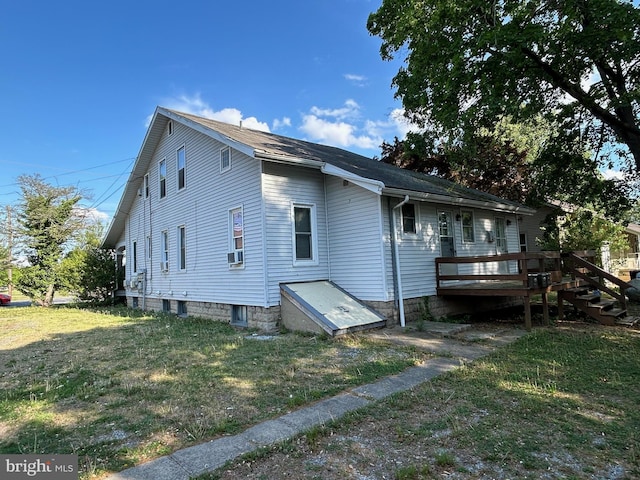 742 S State St, Dover, DE 19901 - view of property exterior with a lawn and a wooden deck