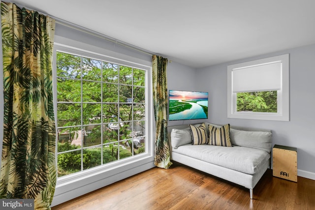 8014 Forest Glen Dr, Pasadena, MD 21122 - living area with wood finished floors and baseboards
