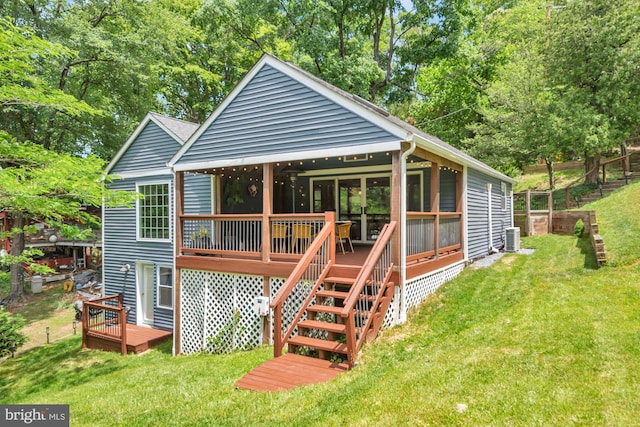 8014 Forest Glen Dr, Pasadena, MD 21122 - back of property with a deck, a yard, central AC unit, and stairs