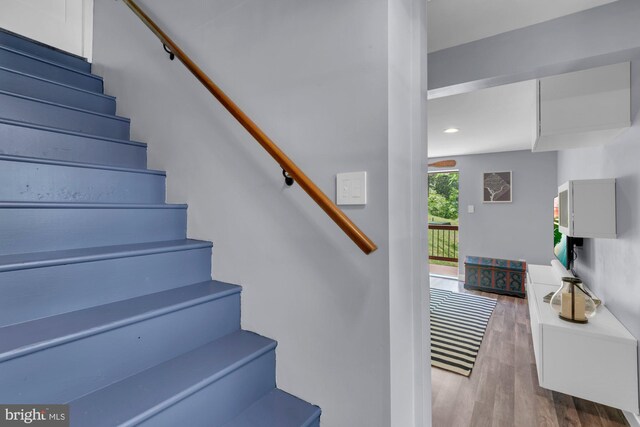 8014 Forest Glen Dr, Pasadena, MD 21122 - stairway with wood finished floors and recessed lighting