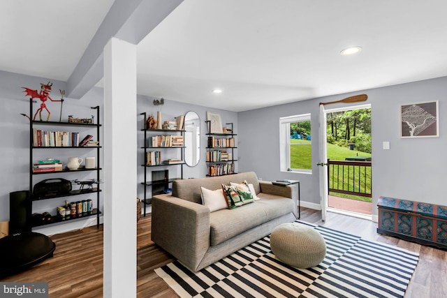 8014 Forest Glen Dr, Pasadena, MD 21122 - living area with wood finished floors, recessed lighting, and baseboards
