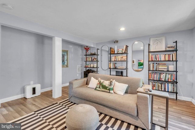 8014 Forest Glen Dr, Pasadena, MD 21122 - living room featuring light wood-type flooring, baseboards, and recessed lighting