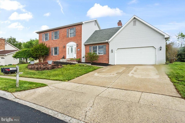 6122 Wallingford Way, Mechanicsburg, PA 17050 - colonial-style house featuring an attached garage, a chimney, a front yard, brick siding, and driveway