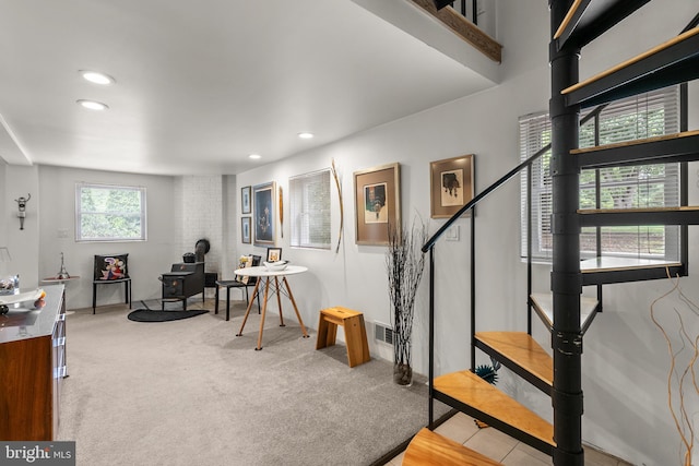 15708 Thompson Rd, Silver Spring, MD 20905 - home office with recessed lighting, carpet, a wood stove, and baseboards
