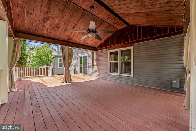 wooden deck featuring ceiling fan