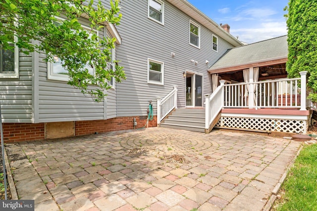 rear view of house featuring a patio