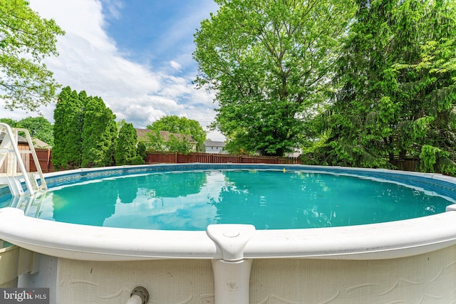 view of pool featuring a fenced backyard