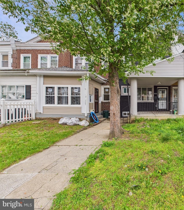 5135 N Fairhill St, Philadelphia, PA 19120 - townhome / multi-family property with a front lawn