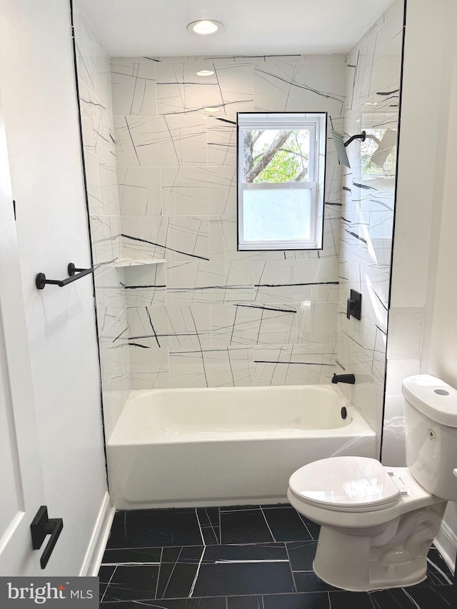 5135 N Fairhill St, Philadelphia, PA 19120 - bathroom featuring toilet, shower / bath combination, tile patterned floors, and baseboards