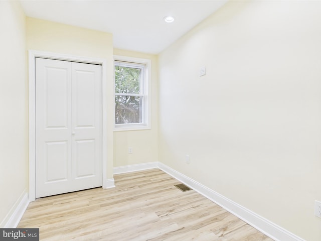 5135 N Fairhill St, Philadelphia, PA 19120 - unfurnished bedroom with light wood finished floors, baseboards, a closet, and recessed lighting