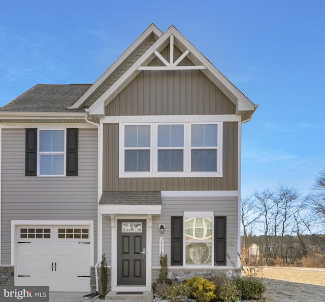 28010 Dew Drop Ln, Millville, DE 19967 - craftsman-style house with a garage, board and batten siding, roof with shingles, and stone siding