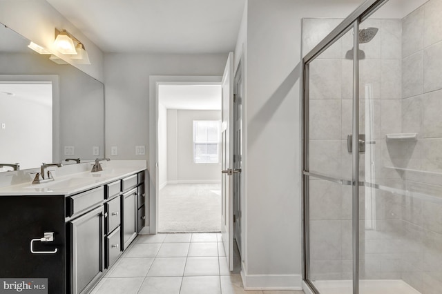 28010 Dew Drop Ln, Millville, DE 19967 - full bathroom with double vanity, a sink, tile patterned flooring, and a stall shower