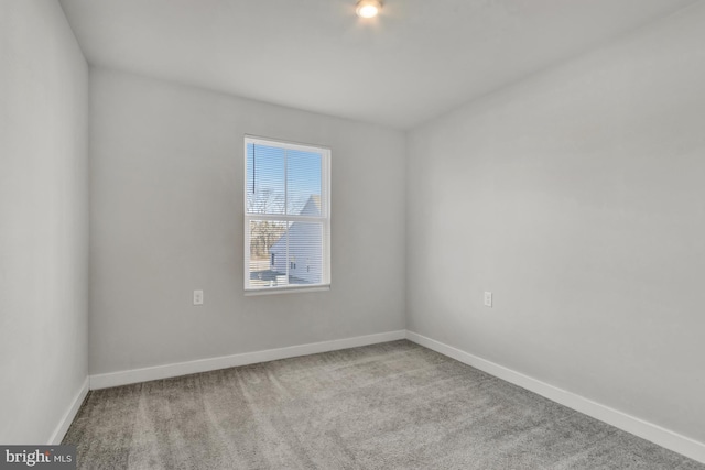 28010 Dew Drop Ln, Millville, DE 19967 - empty room featuring baseboards and carpet