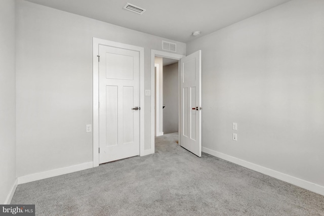 28010 Dew Drop Ln, Millville, DE 19967 - unfurnished bedroom with baseboards, carpet flooring, and visible vents