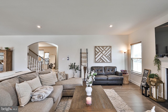 3911 Dewalt St, Bethlehem, PA 18020 - living area featuring recessed lighting, arched walkways, stairs, and wood finished floors