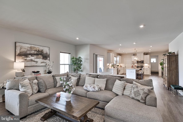 3911 Dewalt St, Bethlehem, PA 18020 - living area featuring light wood-style floors, recessed lighting, and baseboards