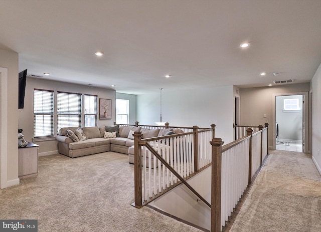 3911 Dewalt St, Bethlehem, PA 18020 - living area featuring recessed lighting, baseboards, visible vents, and light carpet