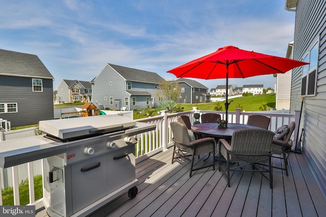 3911 Dewalt St, Bethlehem, PA 18020 - wooden deck with grilling area, a residential view, and outdoor dining space