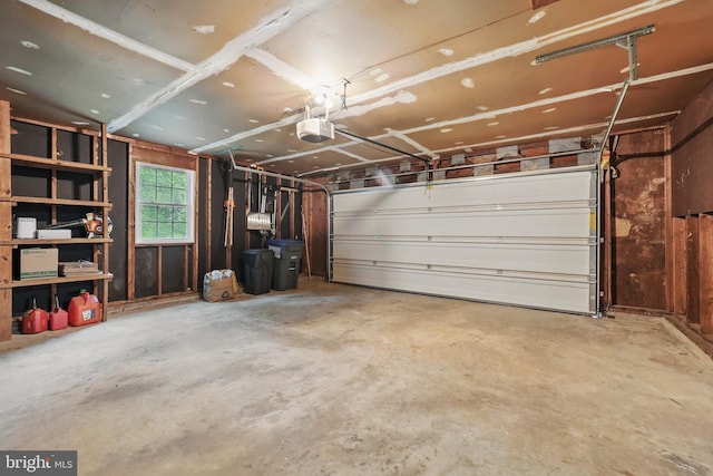 garage featuring a garage door opener