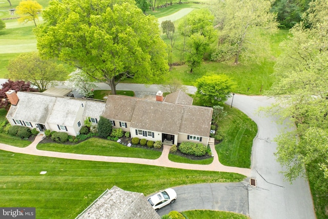 bird's eye view with view of golf course