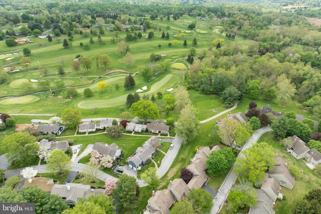 bird's eye view featuring golf course view and a residential view