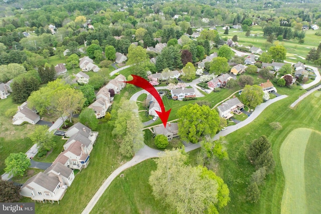birds eye view of property with a residential view
