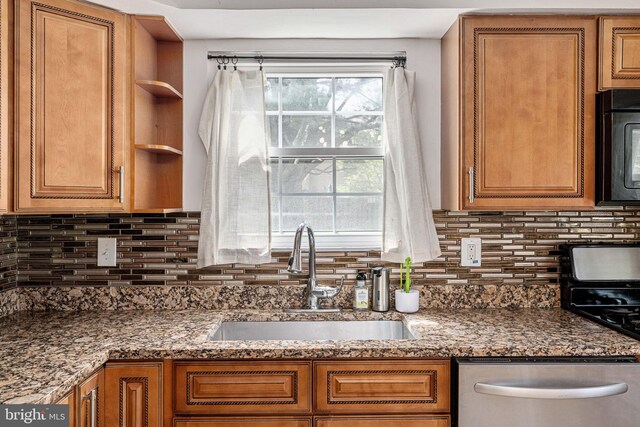 kitchen with a sink, black microwave, dishwasher, decorative backsplash, and open shelves