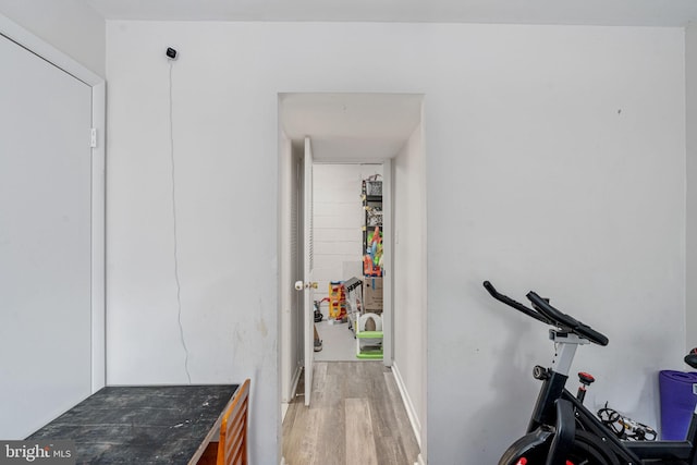 exercise area with light wood finished floors