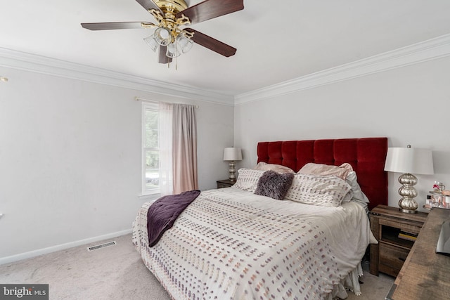 bedroom featuring ornamental molding, carpet flooring, baseboards, and ceiling fan