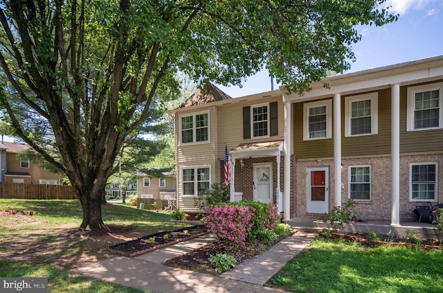 view of front of property with brick siding