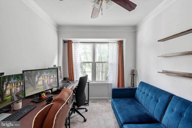 office area with carpet flooring, ceiling fan, crown molding, and baseboards