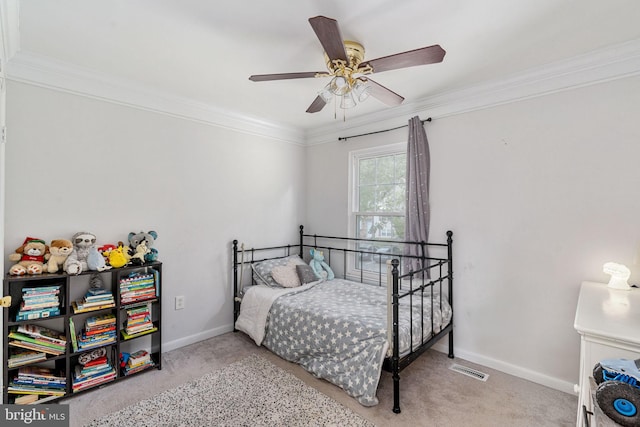 bedroom with carpet, ornamental molding, baseboards, and a ceiling fan