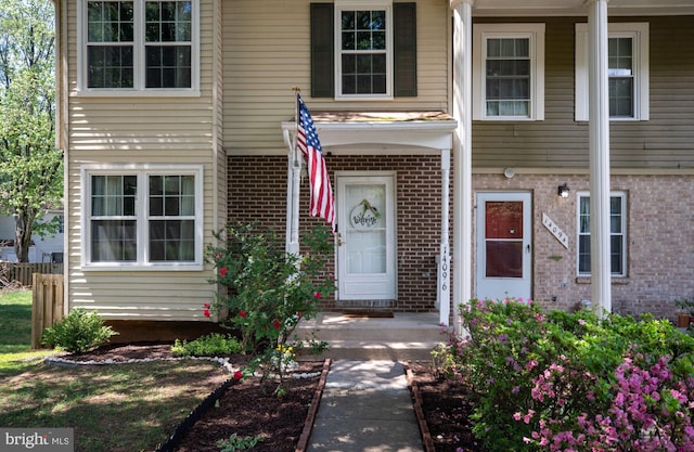 view of front of home with brick siding