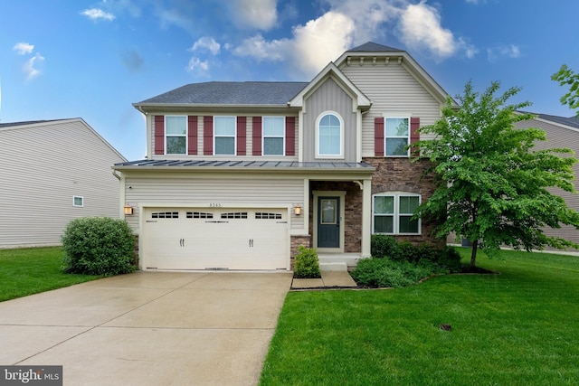 8365 Eagle St, Glen Burnie, MD 21060 - view of front of property featuring a standing seam roof, an attached garage, concrete driveway, a front lawn, and stone siding