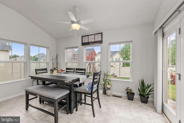 8365 Eagle St, Glen Burnie, MD 21060 - dining area with lofted ceiling, baseboards, a ceiling fan, and light tile patterned floors