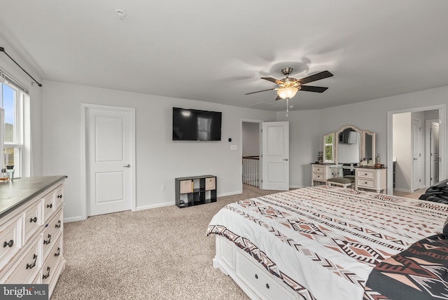 8365 Eagle St, Glen Burnie, MD 21060 - bedroom with light carpet, baseboards, and ceiling fan