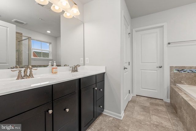 8365 Eagle St, Glen Burnie, MD 21060 - bathroom featuring a bath, double vanity, a shower stall, and baseboards