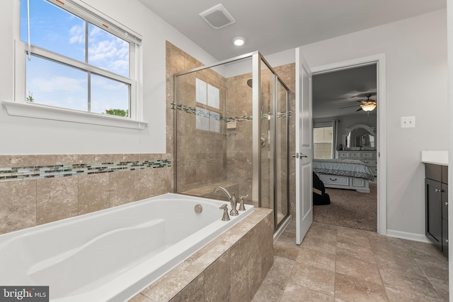 8365 Eagle St, Glen Burnie, MD 21060 - ensuite bathroom with a garden tub, a stall shower, vanity, a ceiling fan, and recessed lighting