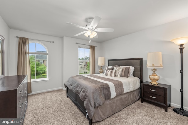 8365 Eagle St, Glen Burnie, MD 21060 - bedroom with light colored carpet, multiple windows, and baseboards