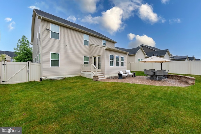 8365 Eagle St, Glen Burnie, MD 21060 - rear view of property featuring a gate and a patio area