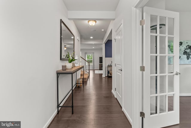 8365 Eagle St, Glen Burnie, MD 21060 - hallway featuring wood finished floors, baseboards, and stairs