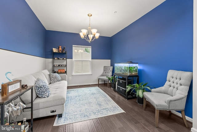 8365 Eagle St, Glen Burnie, MD 21060 - living room with a chandelier, wood finished floors, and baseboards