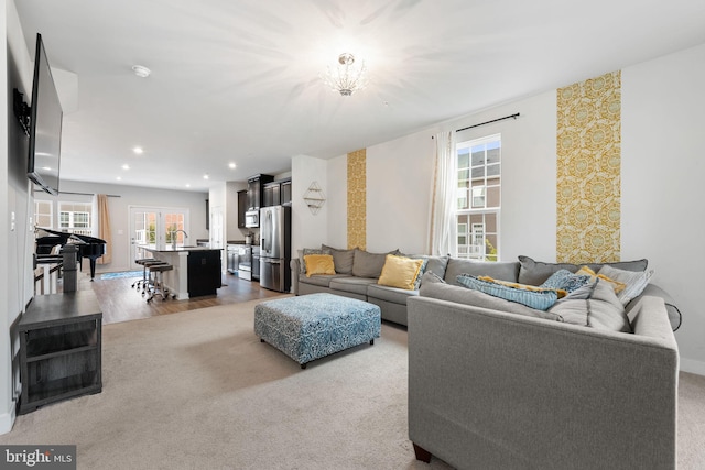 9912 Vista Pointe Dr, Upper Marlboro, MD 20774 - living area with baseboards, carpet flooring, a healthy amount of sunlight, and wallpapered walls