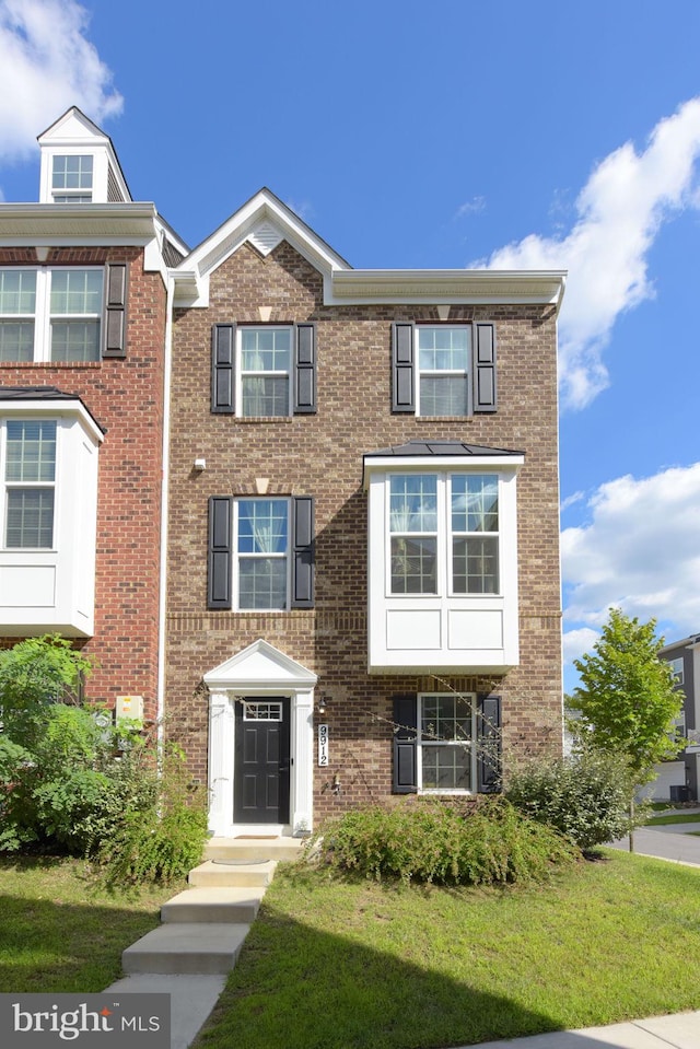 9912 Vista Pointe Dr, Upper Marlboro, MD 20774 - multi unit property featuring a front lawn and brick siding