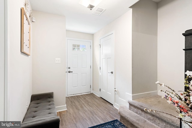 9912 Vista Pointe Dr, Upper Marlboro, MD 20774 - entryway featuring baseboards, visible vents, and wood finished floors