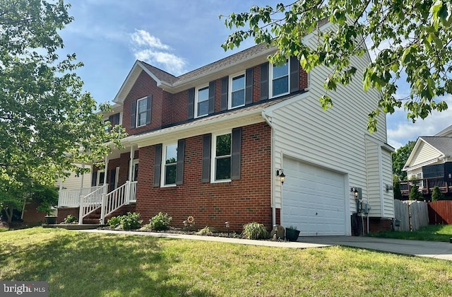 view of front of property with fence, a front yard, brick siding, concrete driveway, and an attached garage